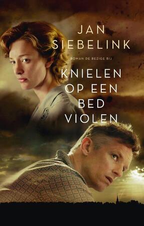 Knielen op een bed violen - Jan Siebelink